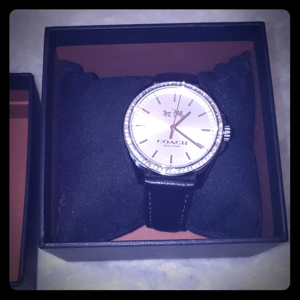 A gorgeous black coach watch